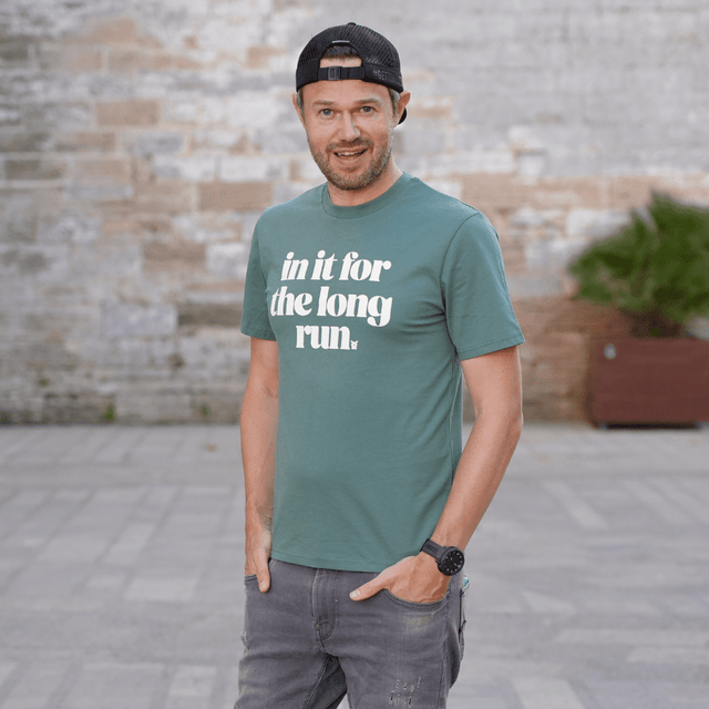 Ben Parkes wearing Green Tee Shirt with the phrase in it for the long run  - perfect gift for runners